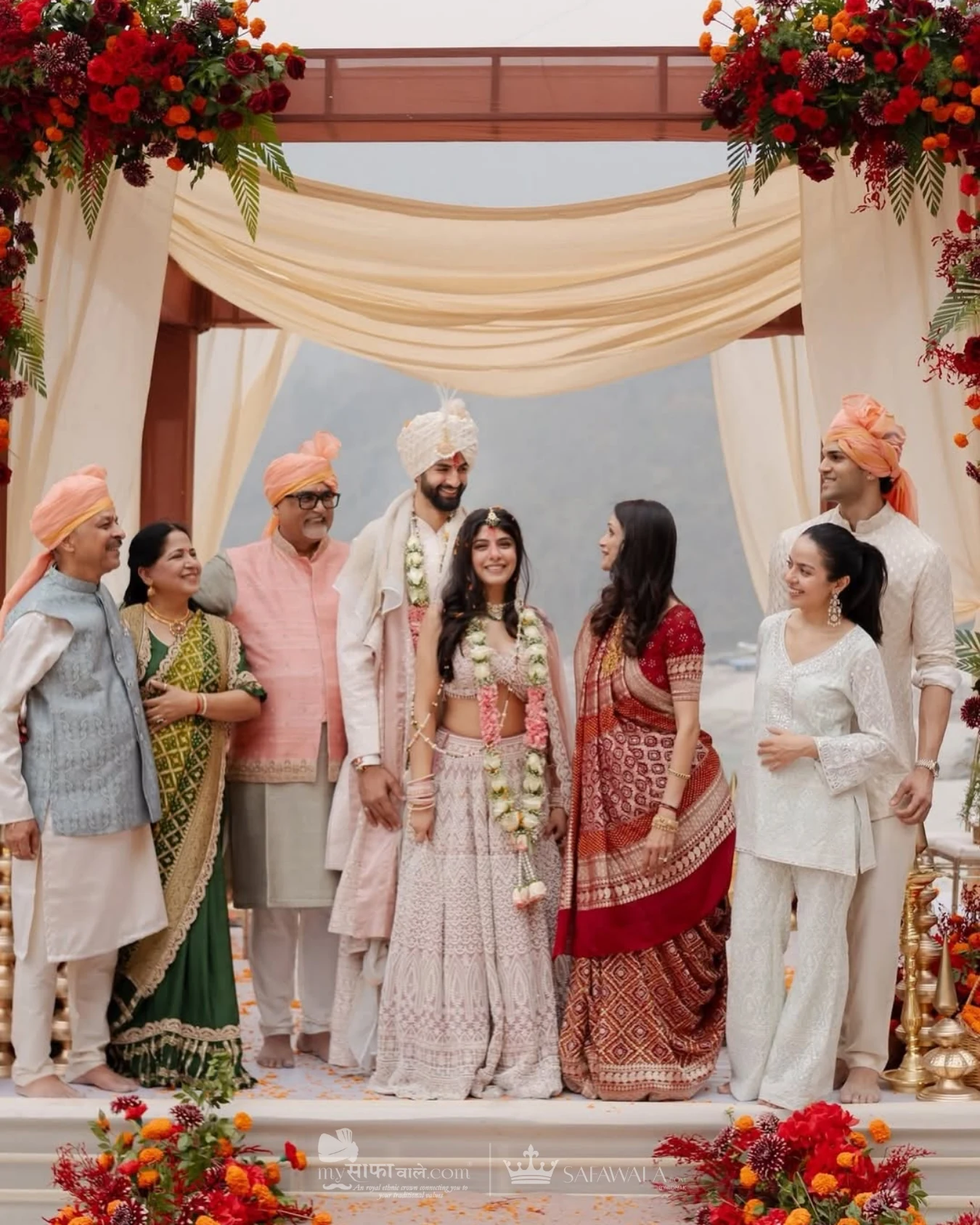 Royal red wedding safa and embroidered groom styling for Raja Park