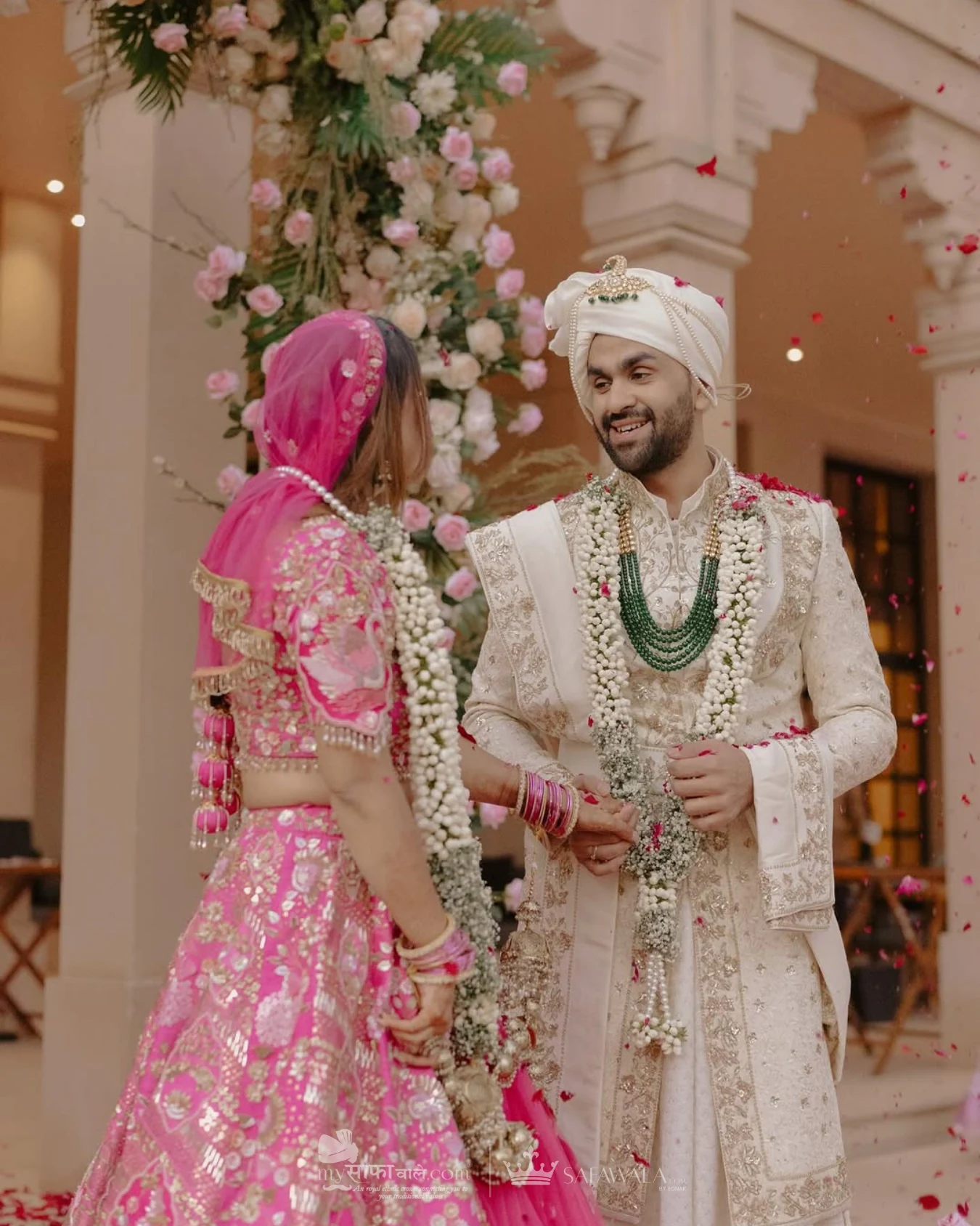 wedding safa wala in Raja Park – Close detail of a red wedding safa with an emerald kalgi